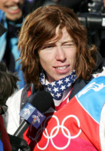US Halfpipe snowboarder Shaun White answers questions after winning the Men's snowboard Halfpipe final on the second day of the Turin 2006 Winter Olympics 12 February 2006 in Bardonecchia, Italy. The Turin Winter Olympics officially opened 10 February setting the ball rolling on a 17-day festival of snow and ice sports. AFP PHOTO JOE KLAMAR/ 56165340
